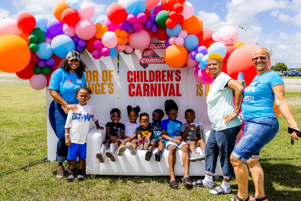Black joy at the photo booth at Color Of Change Children's Carnival in Miami Credit: Réya Photography